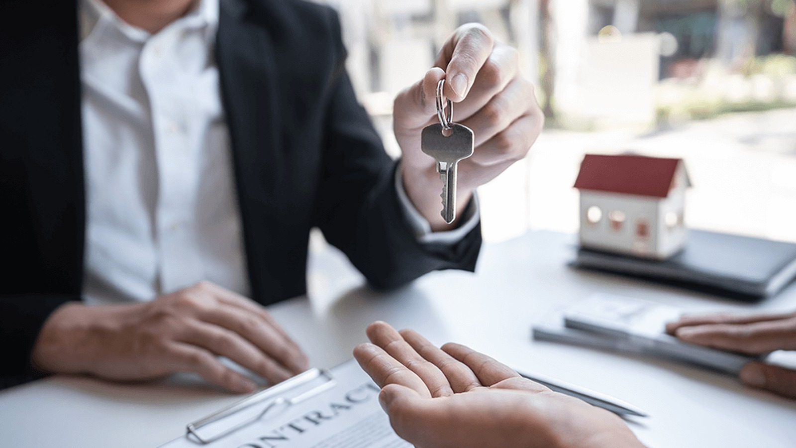 Keys being handed over at tenancy sign-up